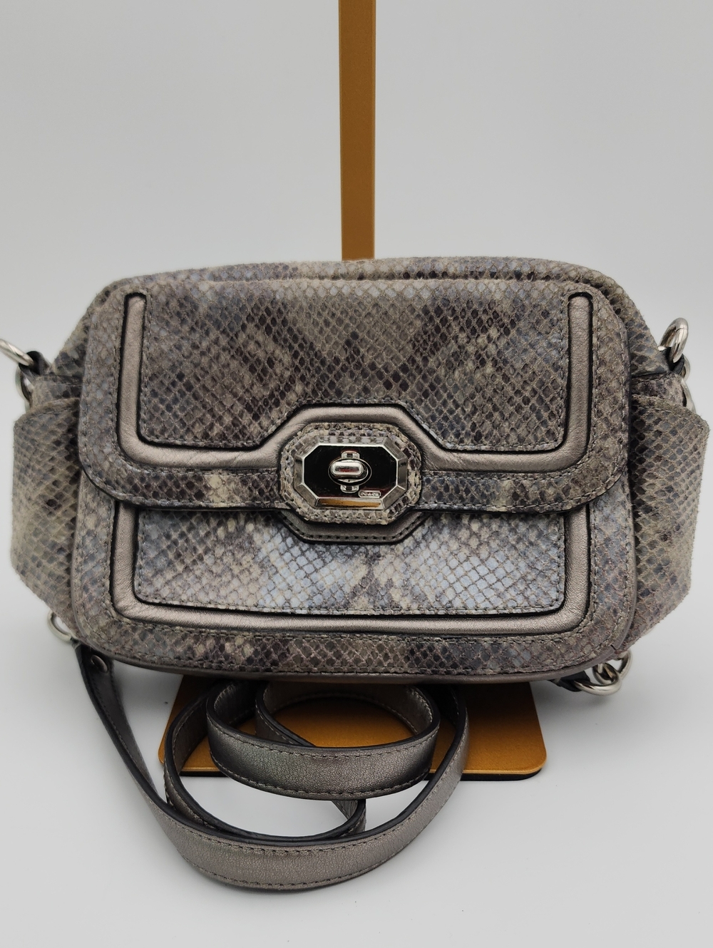 Coach Grey Snake-Print Crossbody Bag with Turn-Lock Closure